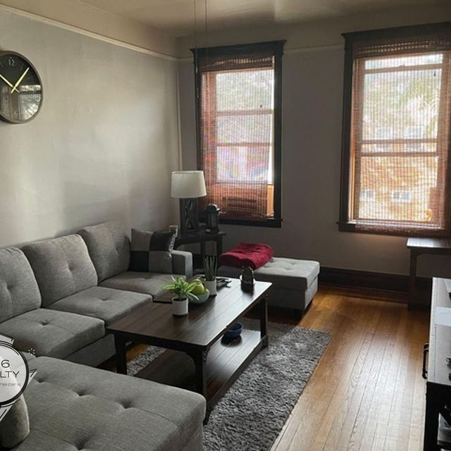 2301 N. Leavitt St.: Before · living room